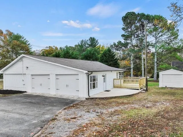 an aerial view of a house having yard