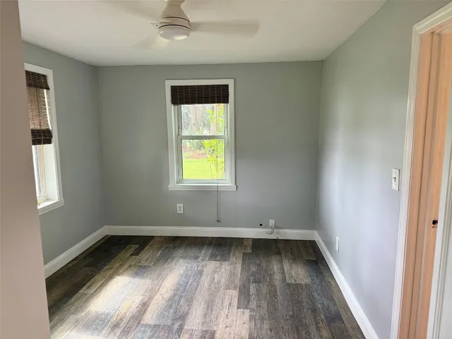 an empty room and window