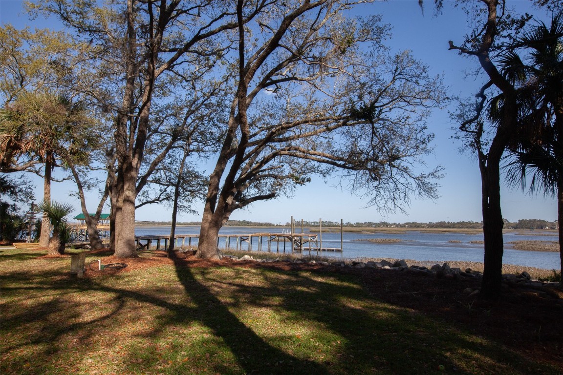 96153 Noeta Place Yulee, FL 32097 - Photo 15 of 24 a view of lake with a yard