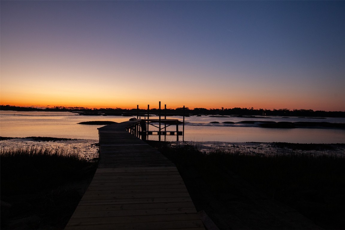 96153 Noeta Place Yulee, FL 32097 - Photo 2 of 24 a view of outside space and a lake view