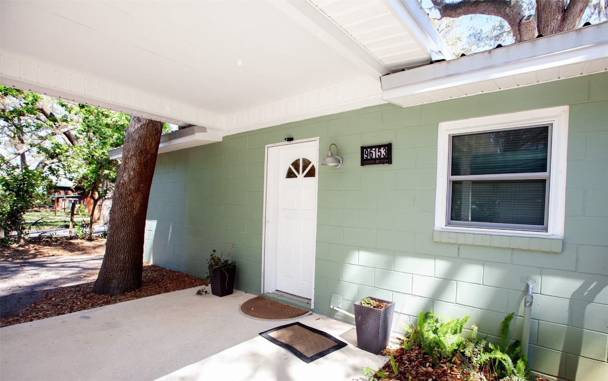 96153 Noeta Place Yulee, FL 32097 - Photo 22 of 24 a house view with a outdoor space