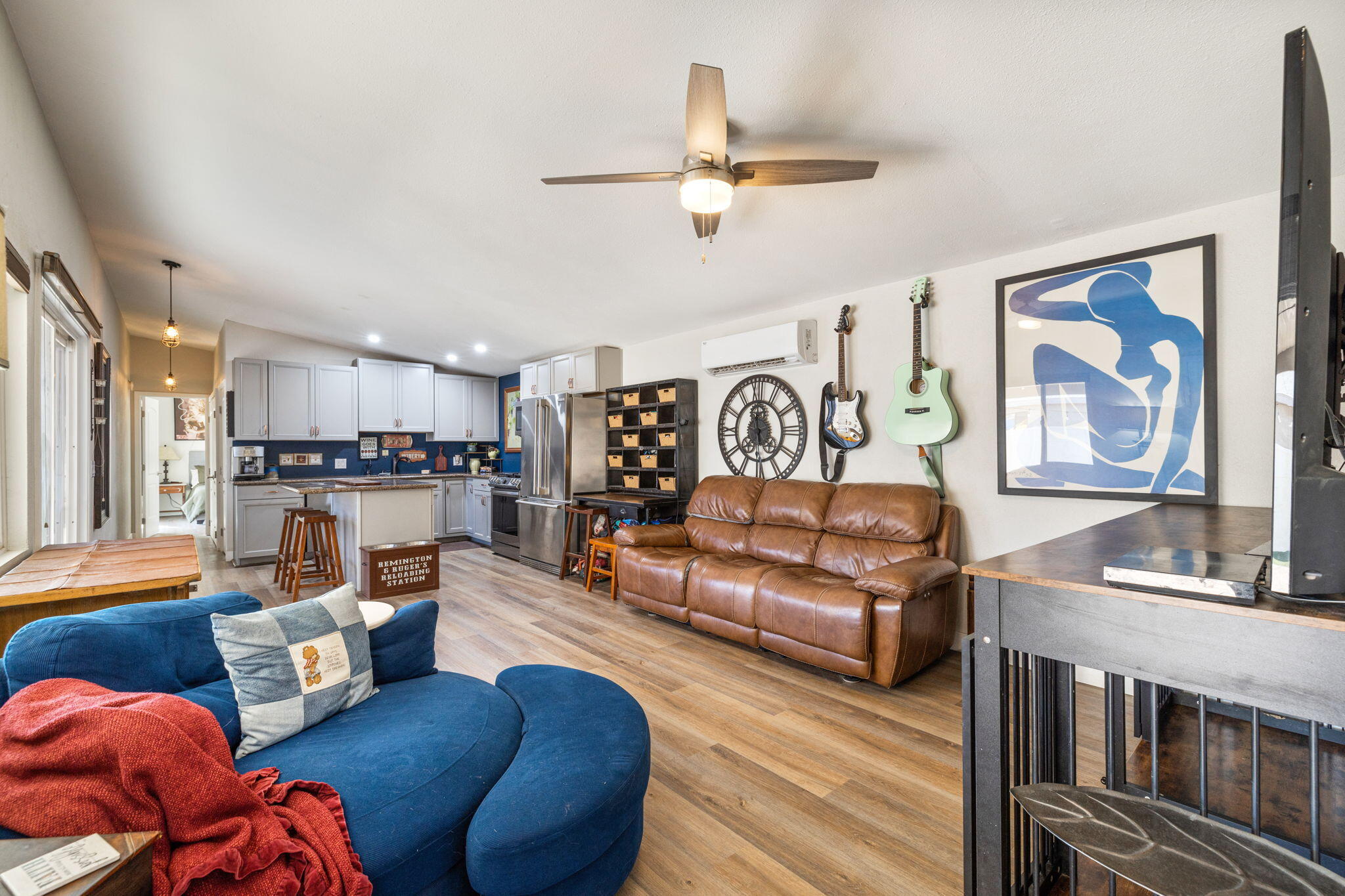 47800 Madison Street, Unit 79 Indio, CA 92201 - Photo 12 of 31 a living room with furniture and a wooden floor
