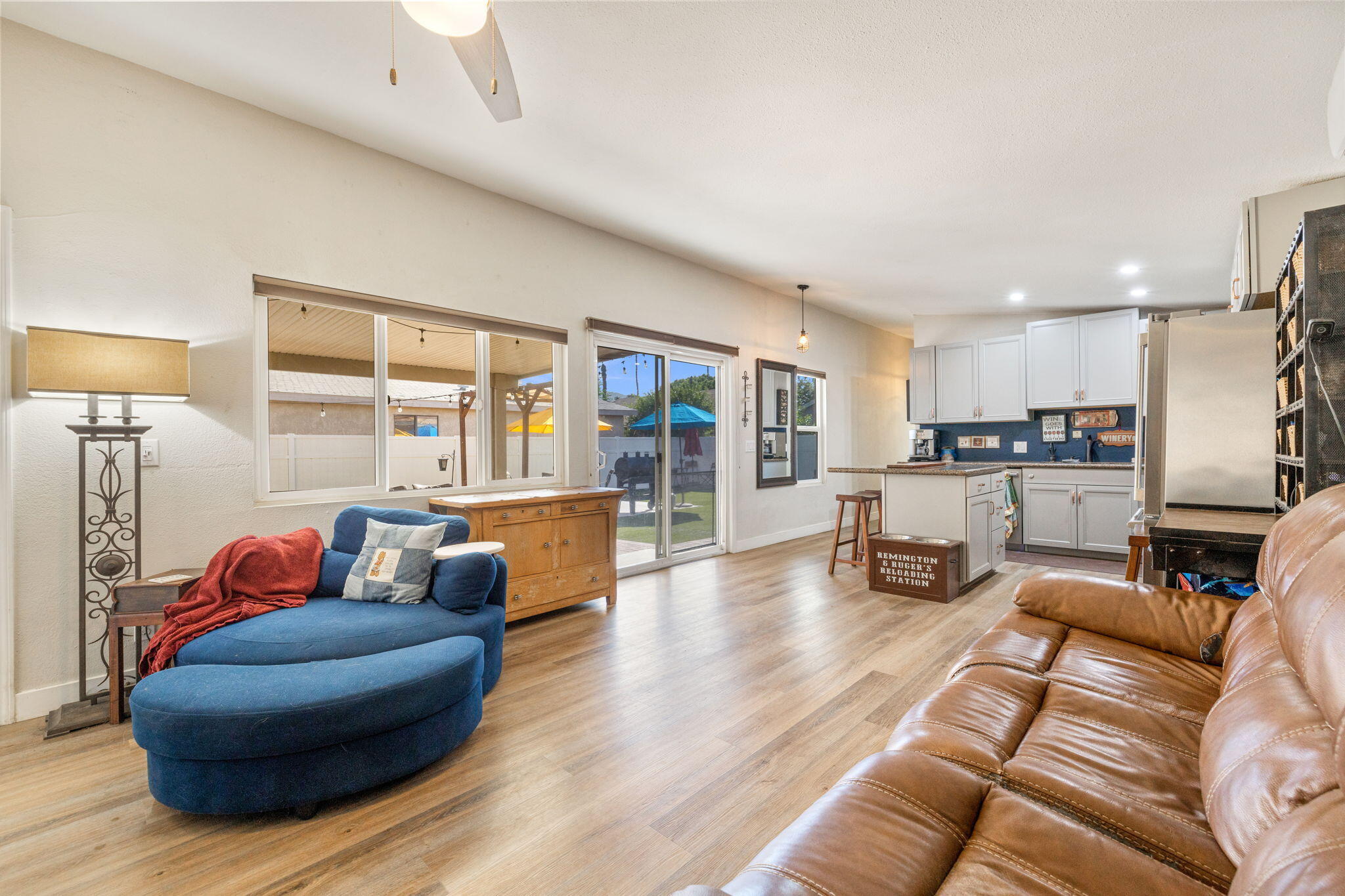 47800 Madison Street, Unit 79 Indio, CA 92201 - Photo 15 of 31 a living room with furniture and a large window
