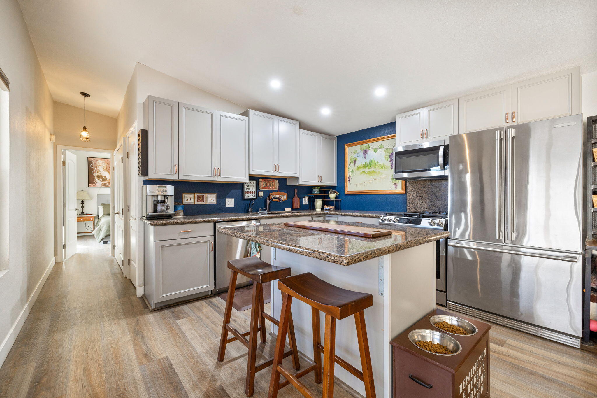 47800 Madison Street, Unit 79 Indio, CA 92201 - Photo 19 of 31 a kitchen with stainless steel appliances granite countertop a refrigerator a stove a sink and a refrigerator
