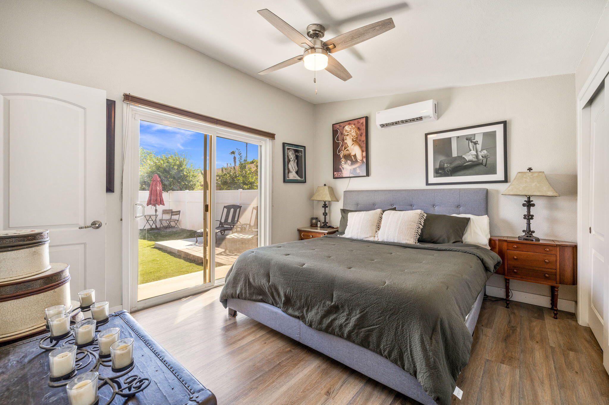 47800 Madison Street, Unit 79 Indio, CA 92201 - Photo 21 of 31 a living room with a bed furniture and a large window