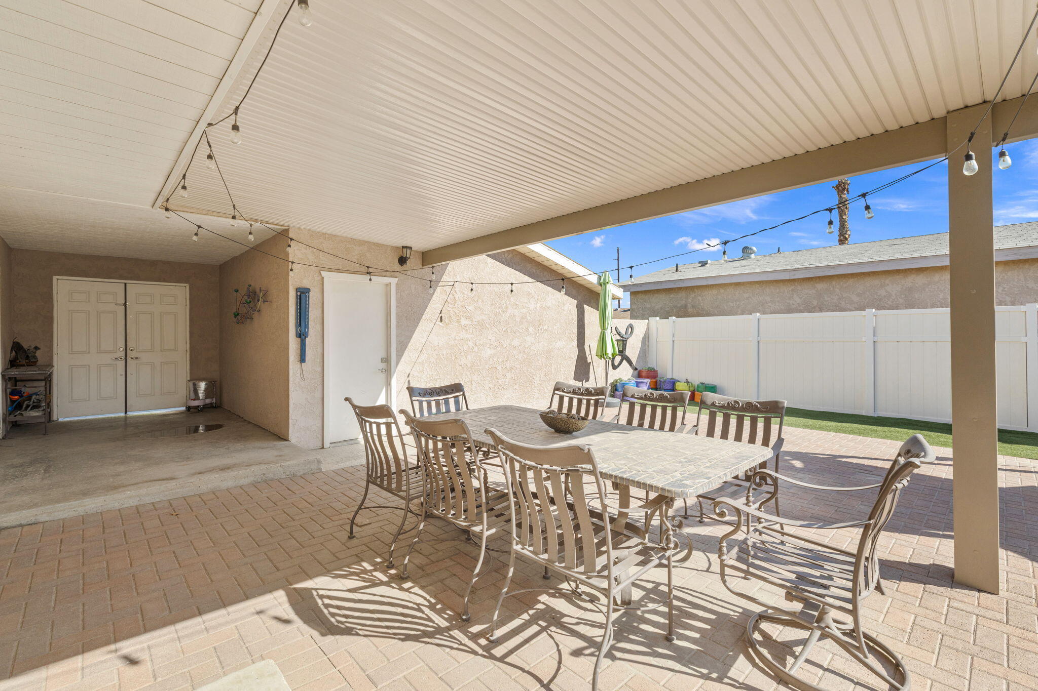 47800 Madison Street, Unit 79 Indio, CA 92201 - Photo 6 of 31 a view of a dining room with furniture window and outside view