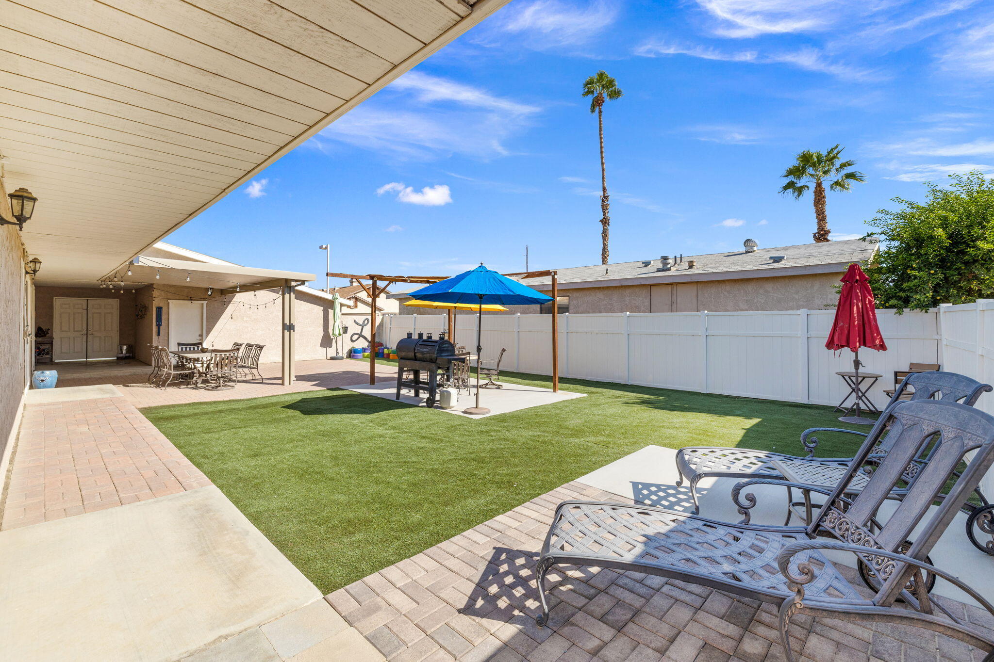 47800 Madison Street, Unit 79 Indio, CA 92201 - Photo 8 of 31 a view of a backyard with sitting area
