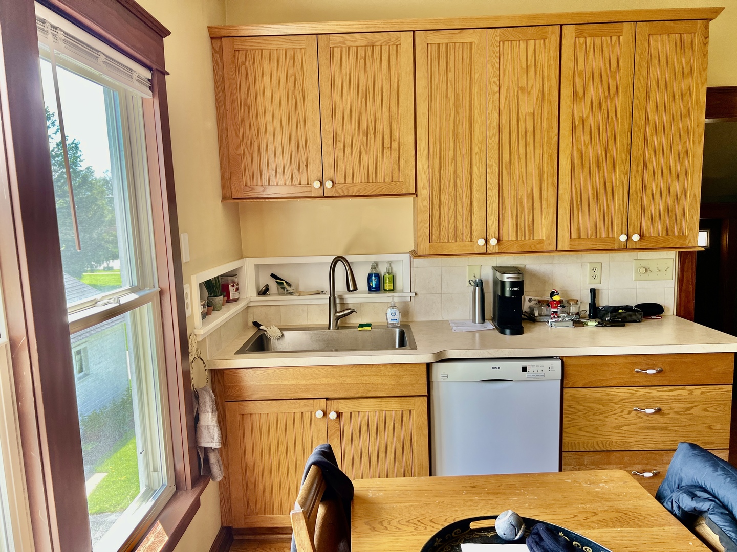 830 Garfield Avenue, Unit UP Batavia, IL 60510 - Photo 6 of 12 a kitchen with a sink appliances and cabinets