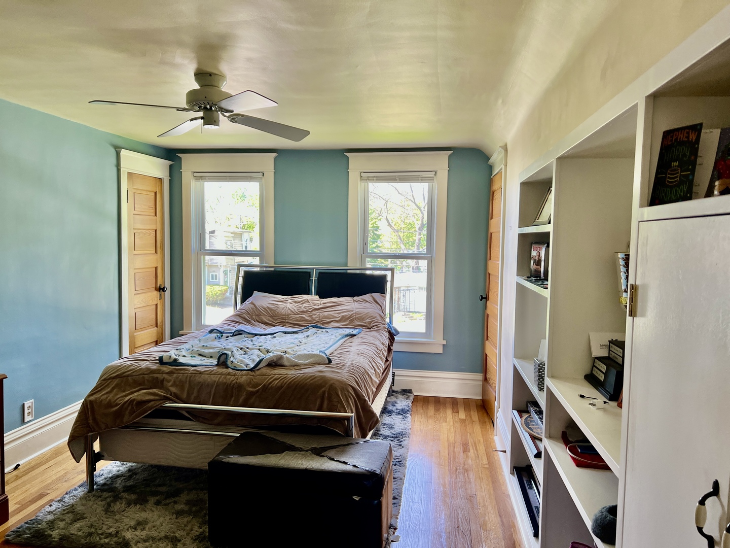 830 Garfield Avenue, Unit UP Batavia, IL 60510 - Photo 9 of 12 a bedroom with a bed and wooden floor