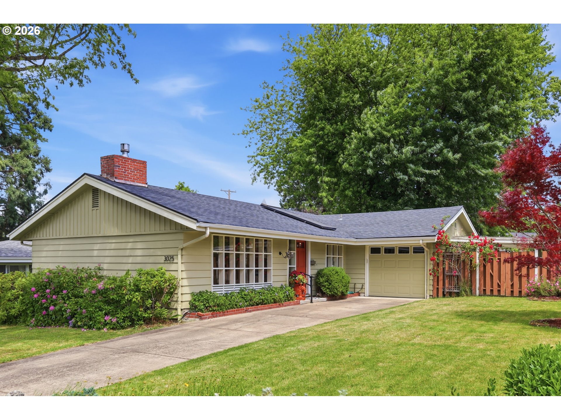 3025 Harris Street Eugene, OR 97405 - Photo 43 of 44 a front view of a house with a yard