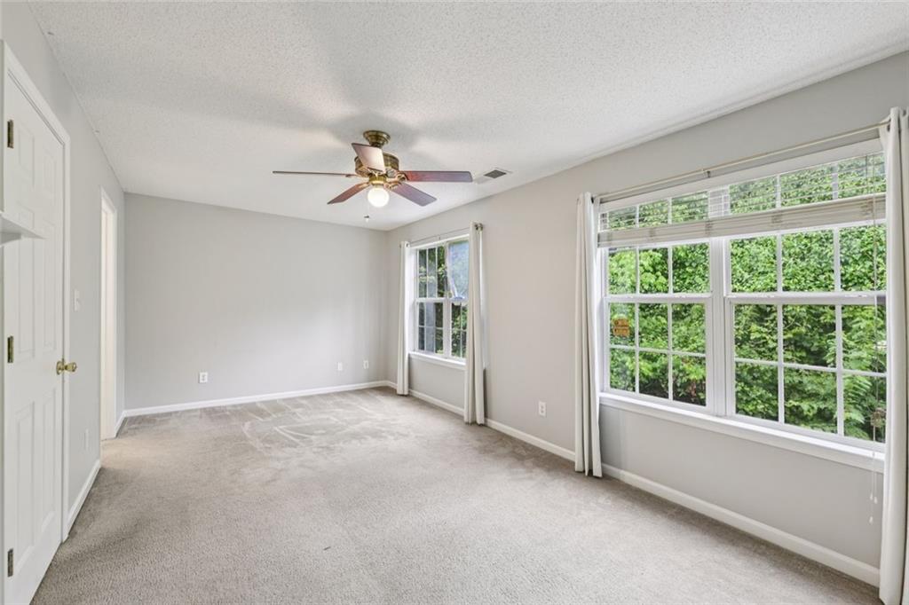 6812 Gallant Circle Southeast, Unit 1 Mableton, GA 30126 - Photo 12 of 24 a view of an empty room with a window