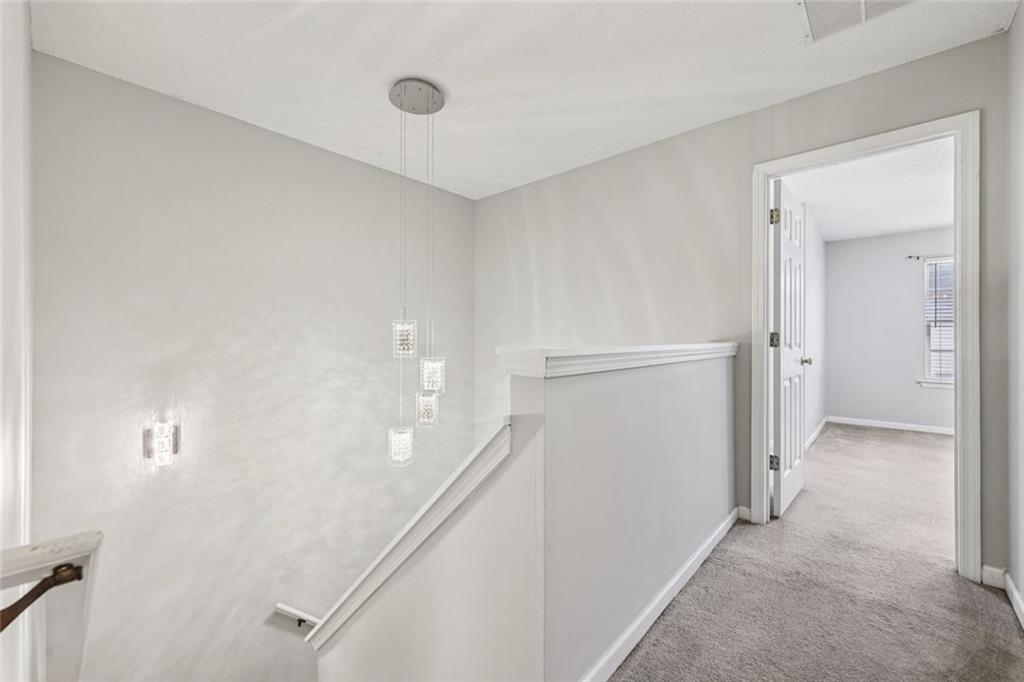 6812 Gallant Circle Southeast, Unit 1 Mableton, GA 30126 - Photo 16 of 24 wooden floor in an empty room