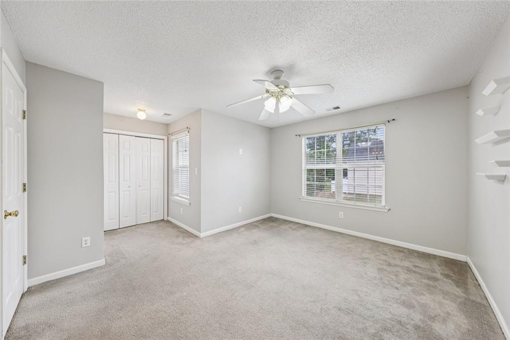 6812 Gallant Circle Southeast, Unit 1 Mableton, GA 30126 - Photo 17 of 24 a view of an empty room with a window