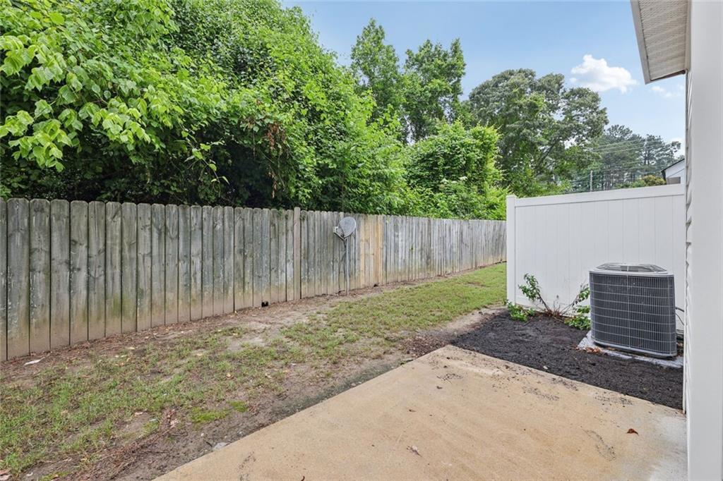 6812 Gallant Circle Southeast, Unit 1 Mableton, GA 30126 - Photo 23 of 24 a backyard of a house