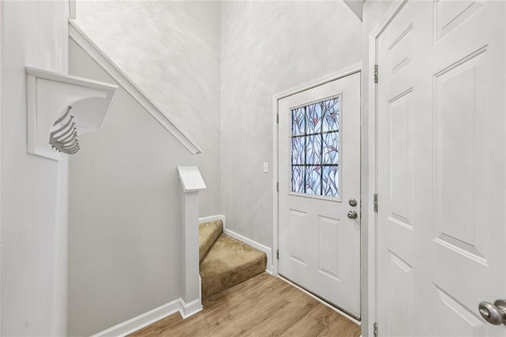 6812 Gallant Circle Southeast, Unit 1 Mableton, GA 30126 - Photo 10 of 24 a view of an entryway with wooden floor