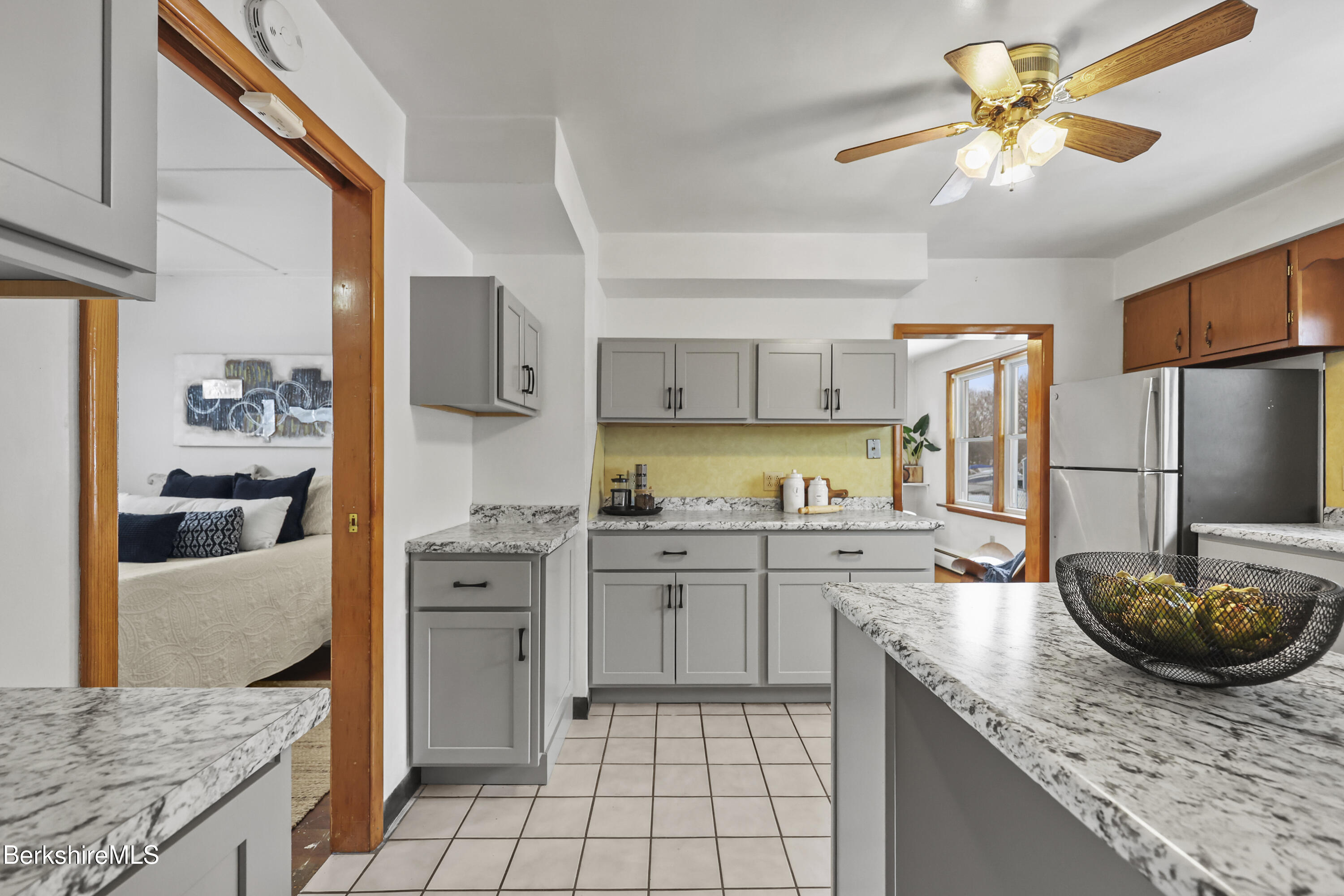 20 Crystal Street Pittsfield, MA 01201 - Photo 11 of 29 a kitchen with stainless steel appliances granite countertop a sink a stove and a refrigerator