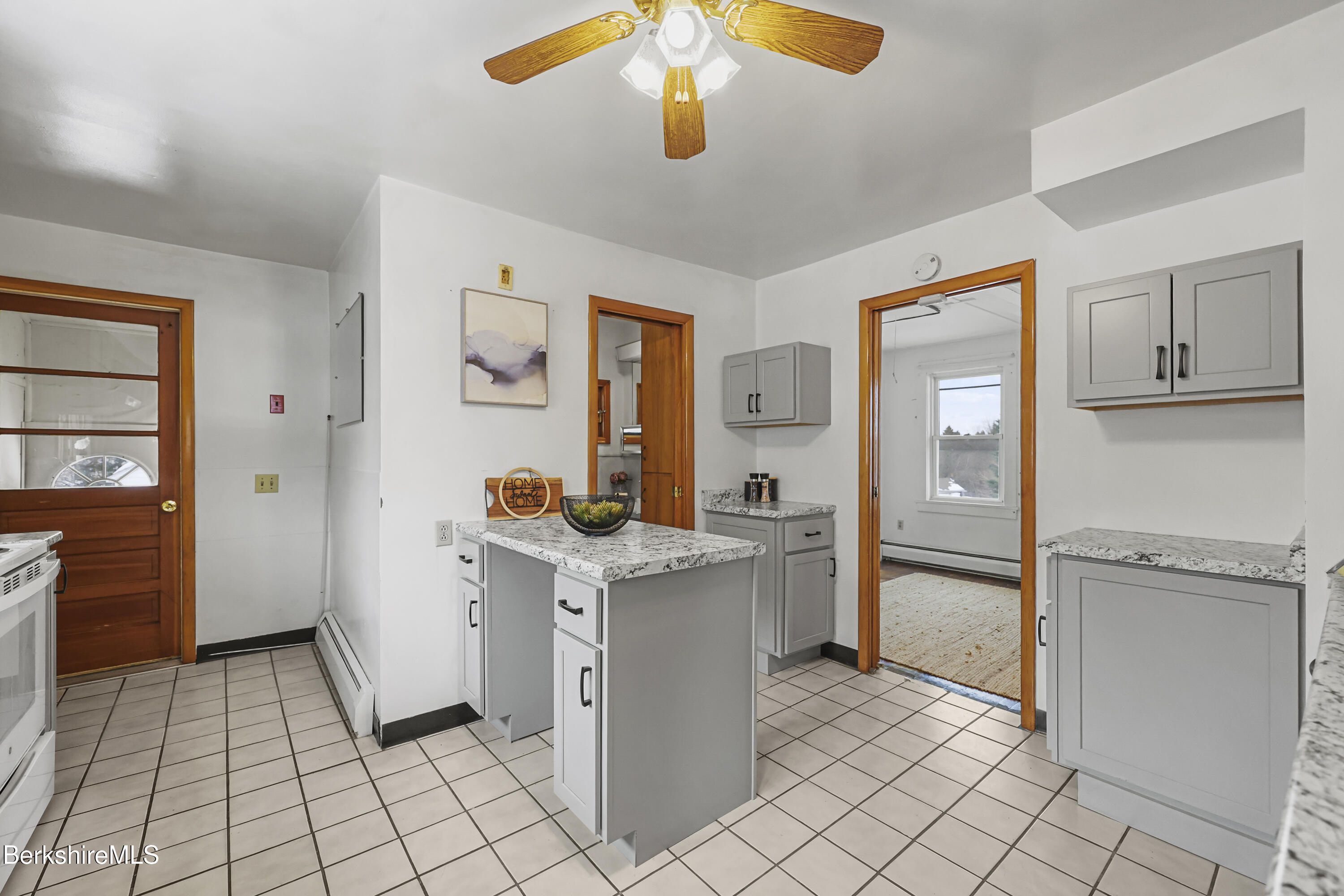 20 Crystal Street Pittsfield, MA 01201 - Photo 16 of 29 a kitchen with stainless steel appliances a stove refrigerator and cabinets