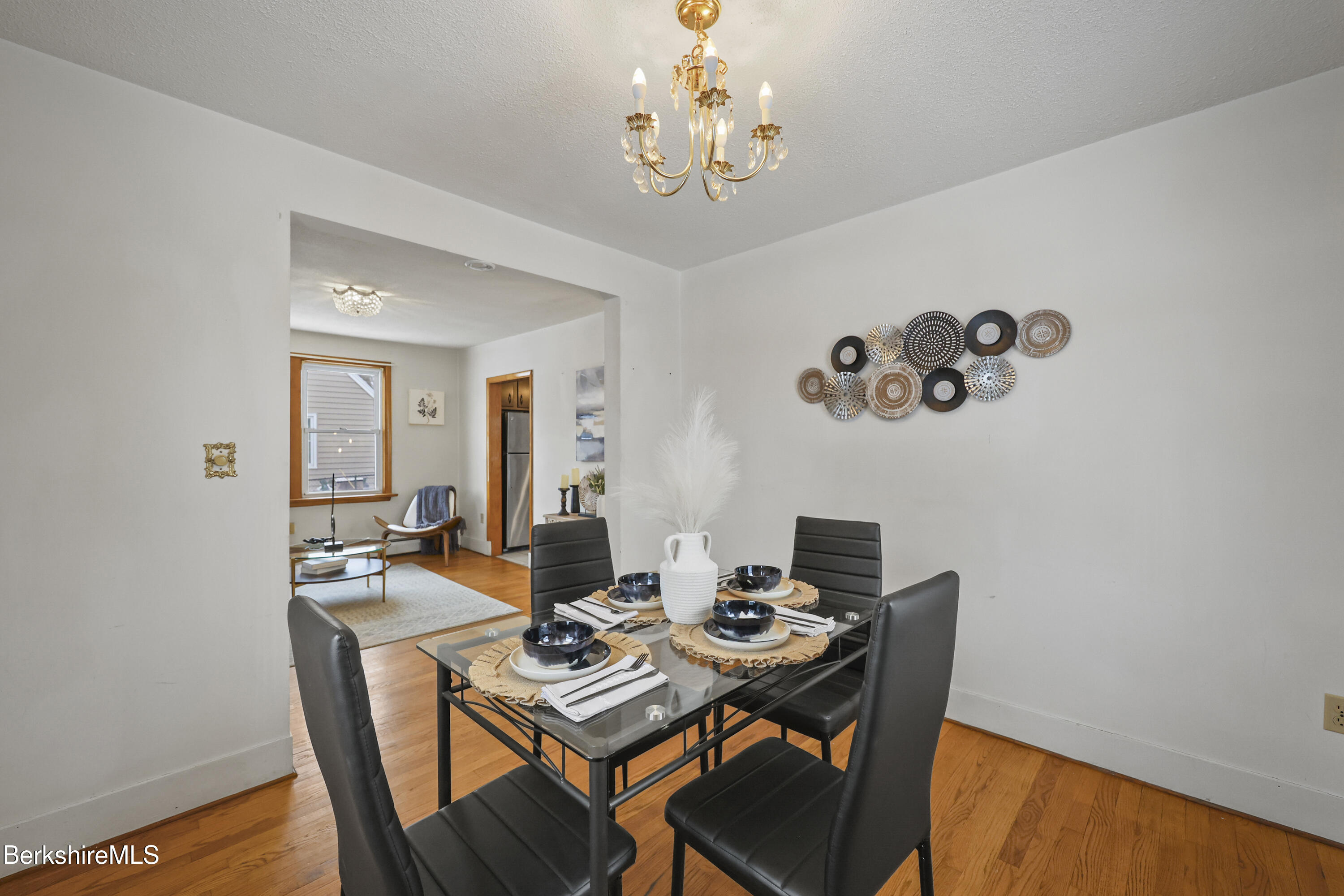 20 Crystal Street Pittsfield, MA 01201 - Photo 17 of 29 a view of a dining room with furniture and chandelier