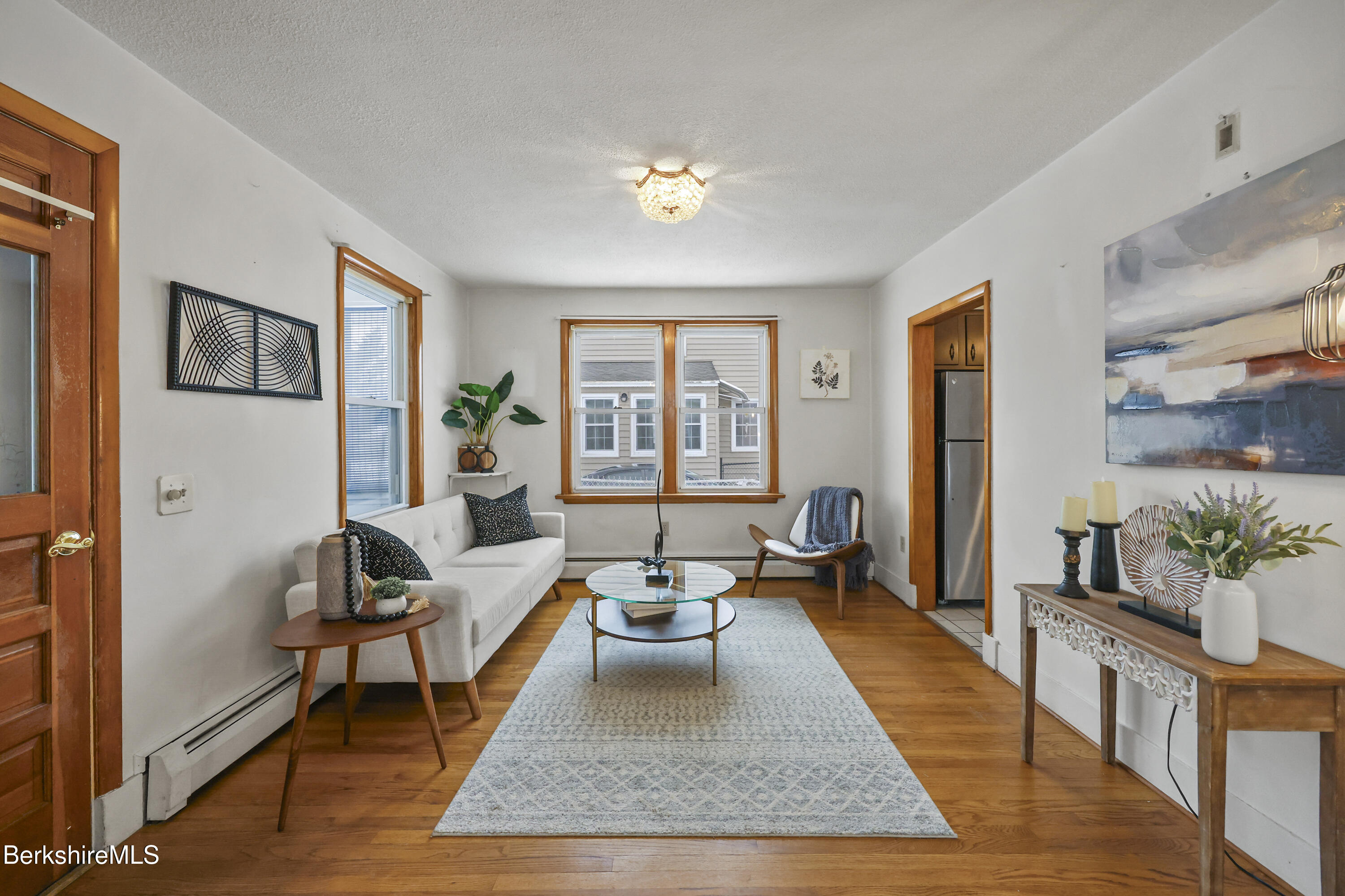 20 Crystal Street Pittsfield, MA 01201 - Photo 8 of 29 a living room with furniture rug and window