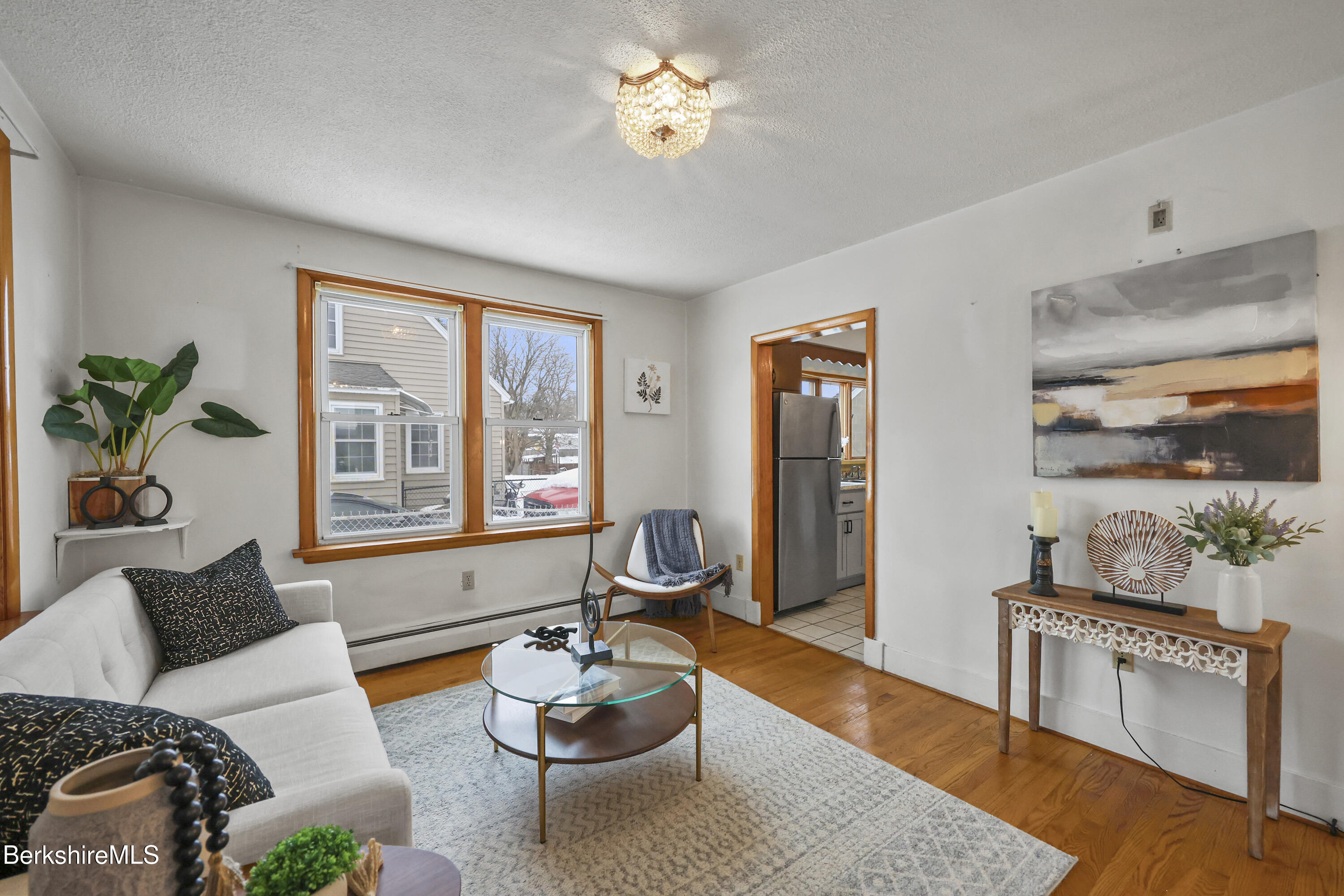 20 Crystal Street Pittsfield, MA 01201 - Photo 9 of 29 a living room with furniture and a large window
