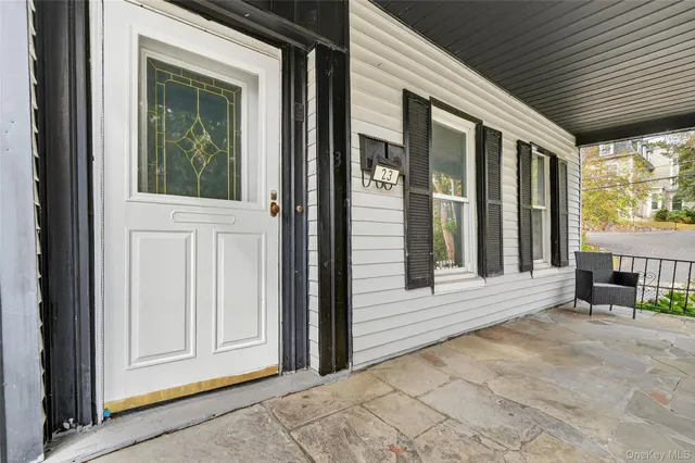 a view of a house with a porch