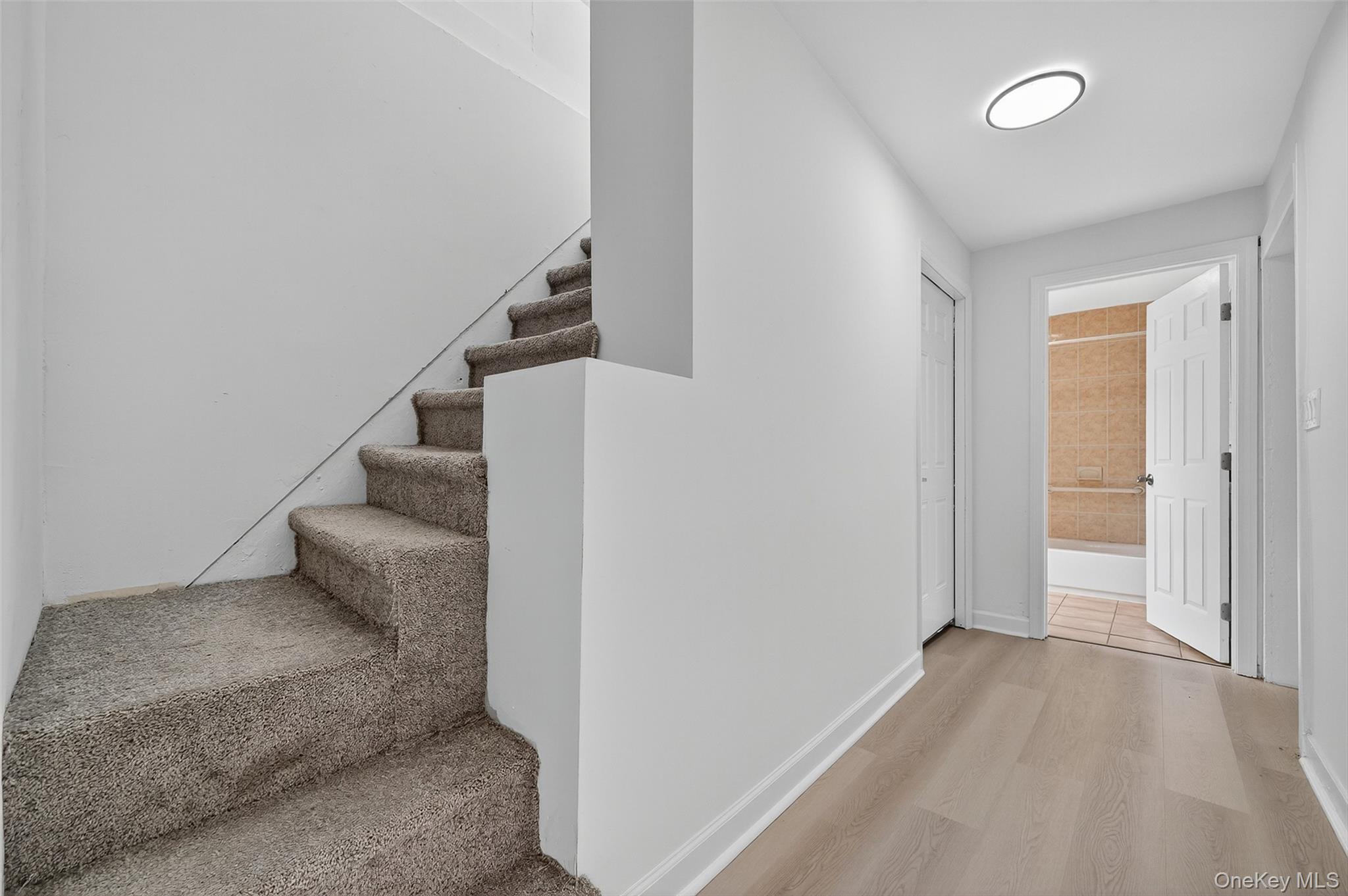23 Ann Street, Unit 2 Ossining, NY 10562 - Photo 10 of 23 a view of entryway and hall with wooden floor