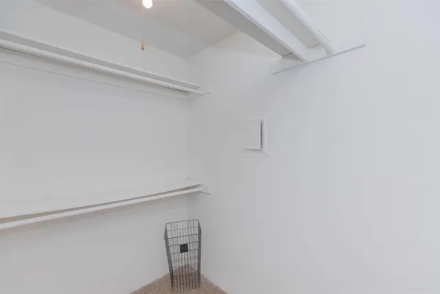 a bathroom with a sink toilet and mirror