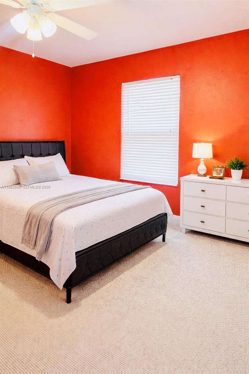 126 Zenith Circle Fort Myers, FL 33913 - Photo 13 of 24 a bedroom with bed and window