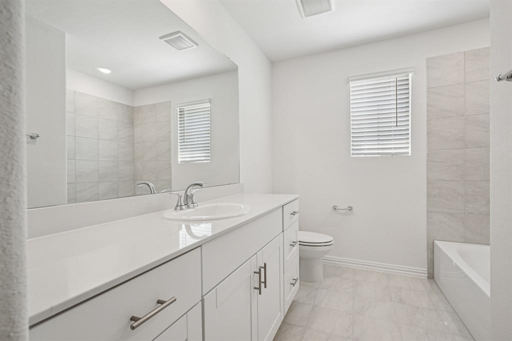 1705 Arches Road Anna, TX 75409 - Photo 24 of 29 Photo is not of the actual home, but is an inspirational photo of builder’s model home and may depict options, furnishings, and/or decorator features that are not included.