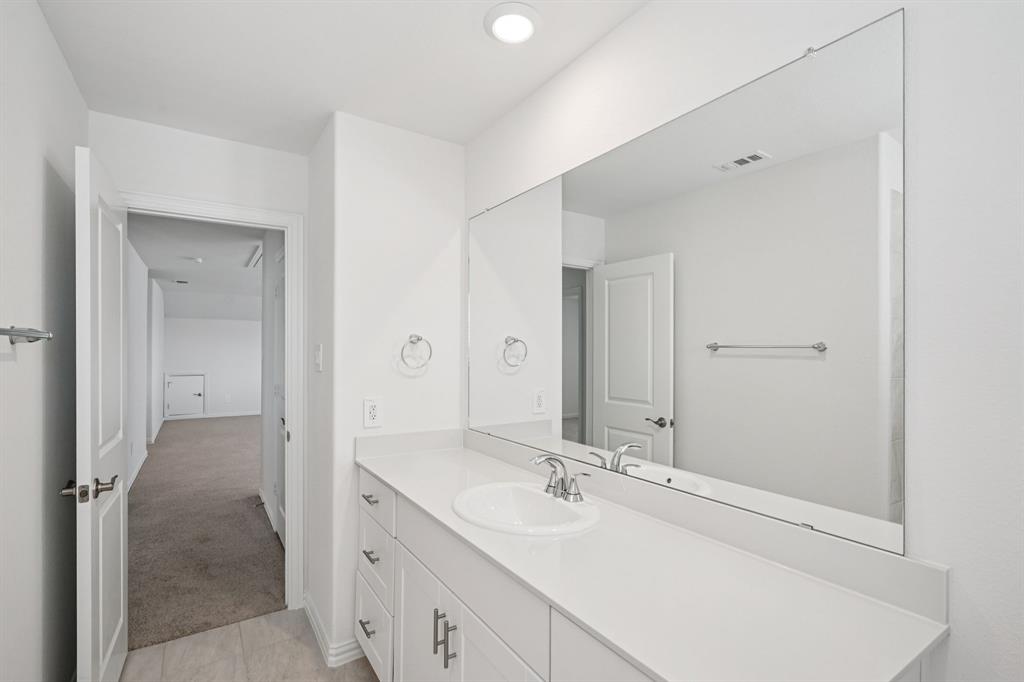 1705 Arches Road Anna, TX 75409 - Photo 26 of 29 Photo is not of the actual home, but is an inspirational photo of builder’s model home and may depict options, furnishings, and/or decorator features that are not included.