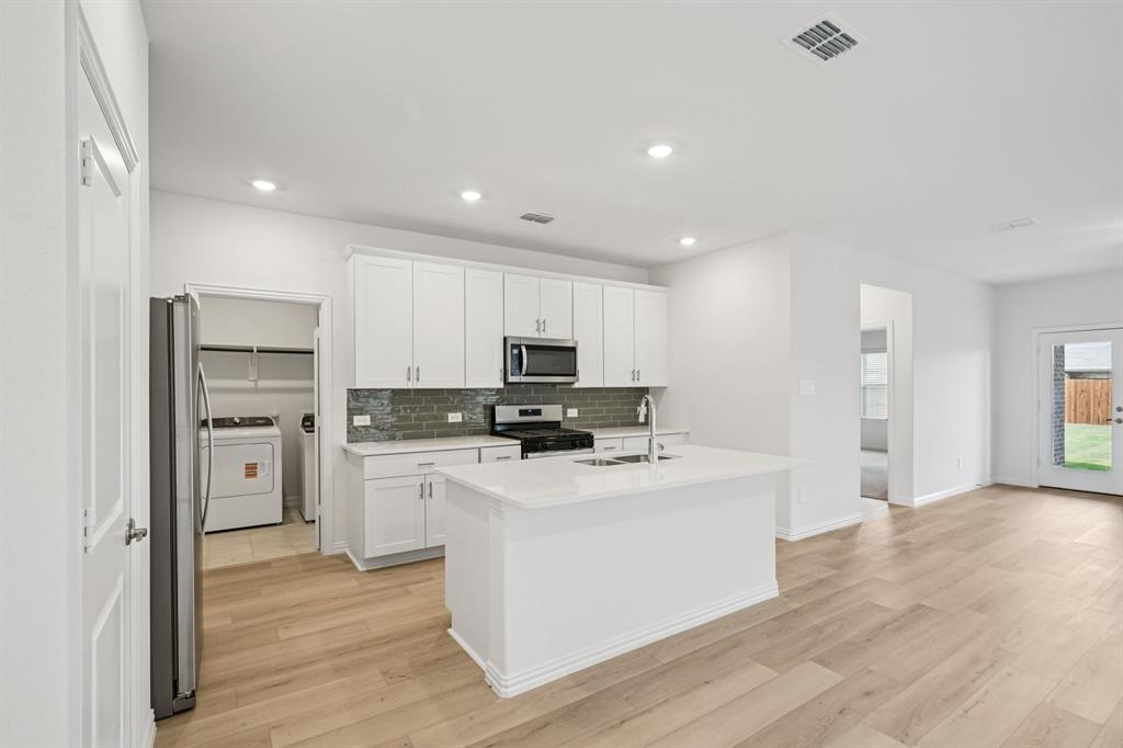 1705 Arches Road Anna, TX 75409 - Photo 5 of 29 Photo is not of the actual home, but is an inspirational photo of builder’s model home and may depict options, furnishings, and/or decorator features that are not included.