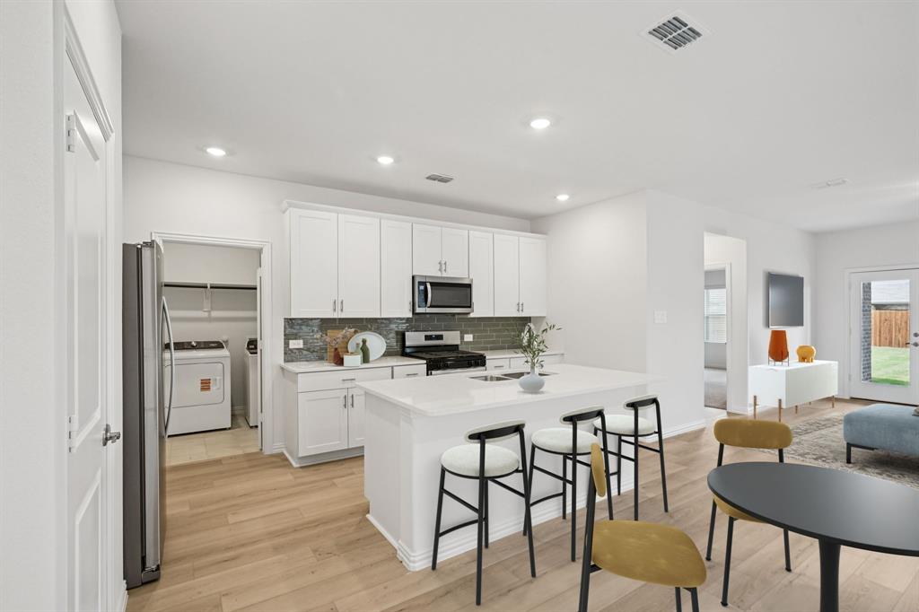 1705 Arches Road Anna, TX 75409 - Photo 6 of 29 Photo is not of the actual home, but is an inspirational photo of builder’s model home and may depict options, furnishings, and/or decorator features that are not included.