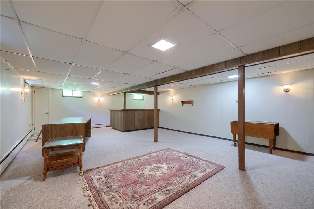 Coldsprings Rd Union Pottstown, PA 19465 - Photo 66 of 71 A versatile basement offers extra living space and a dedicated bar area.