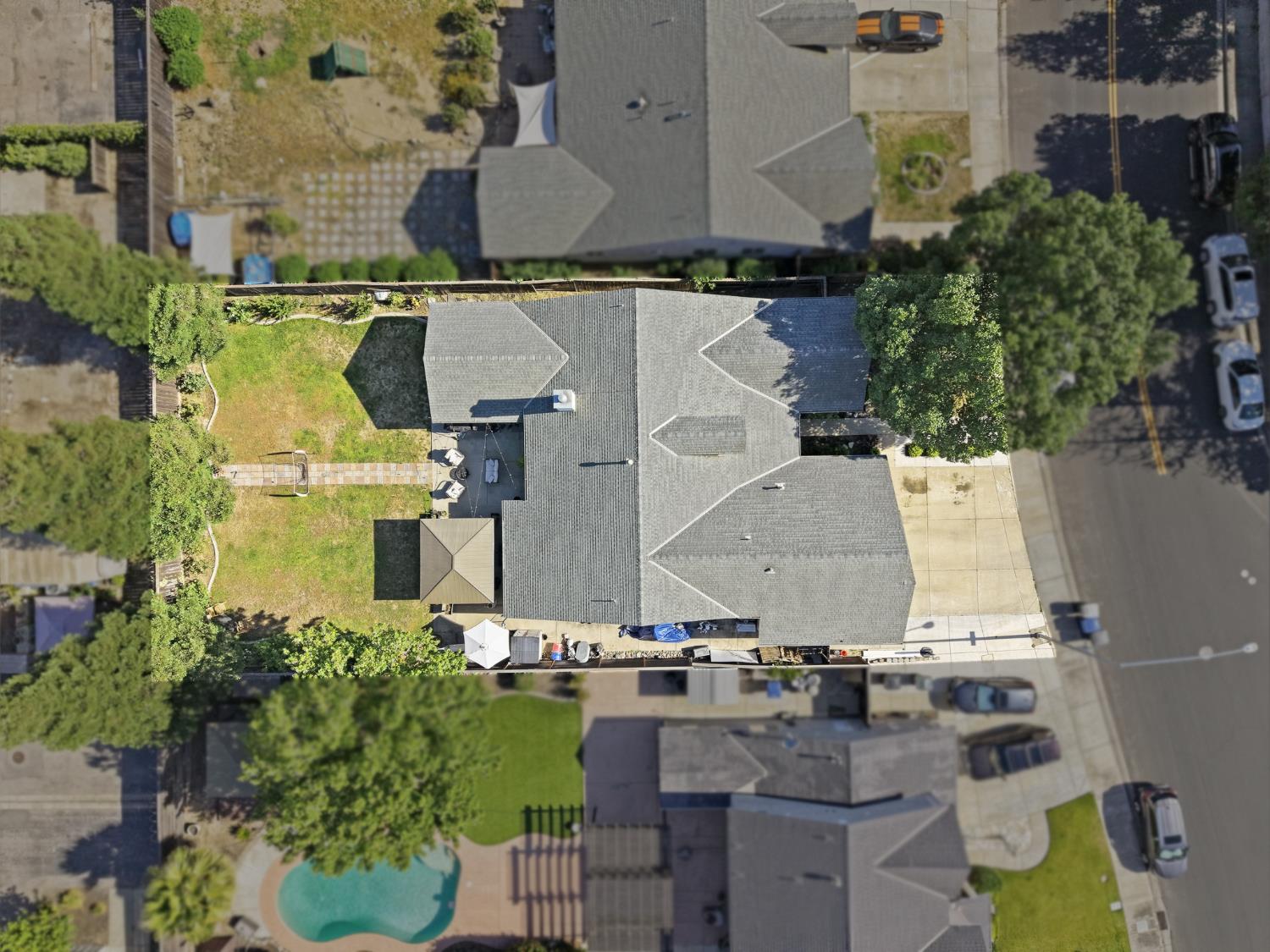 2220 Ellison Drive Modesto, CA 95355 - Photo 53 of 53 an aerial view of residential houses with outdoor space and parking