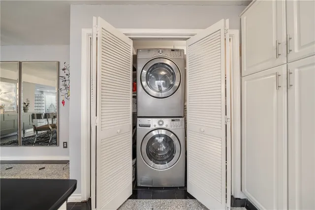 a room with a sink and a mirror