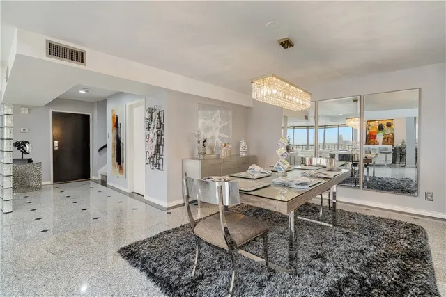 a view of livingroom with furniture and floor to ceiling window