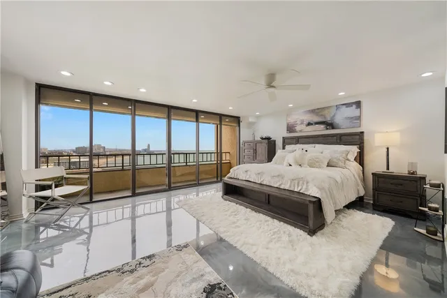 a bathroom with a sink a mirror and a shower