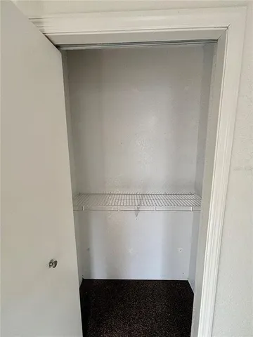 a view of small space with racks on the wall