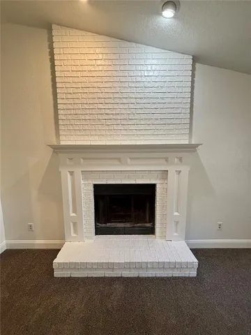 a living room with a fireplace