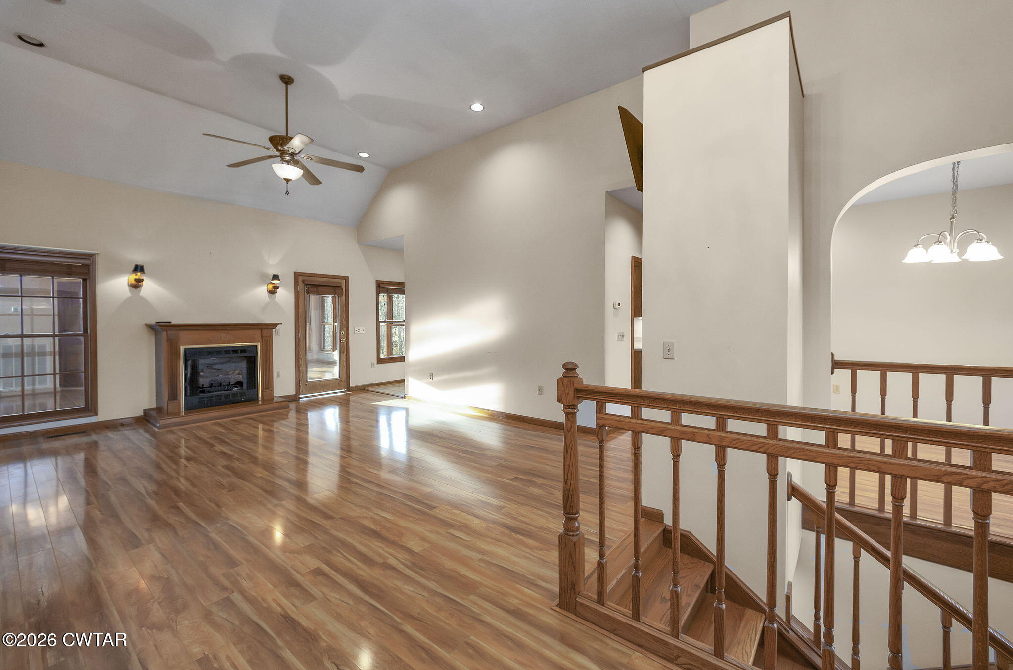 40 Pine Cove Parsons, TN 38363 - Photo 11 of 56 a view of a livingroom with wooden floor and a ceiling fan