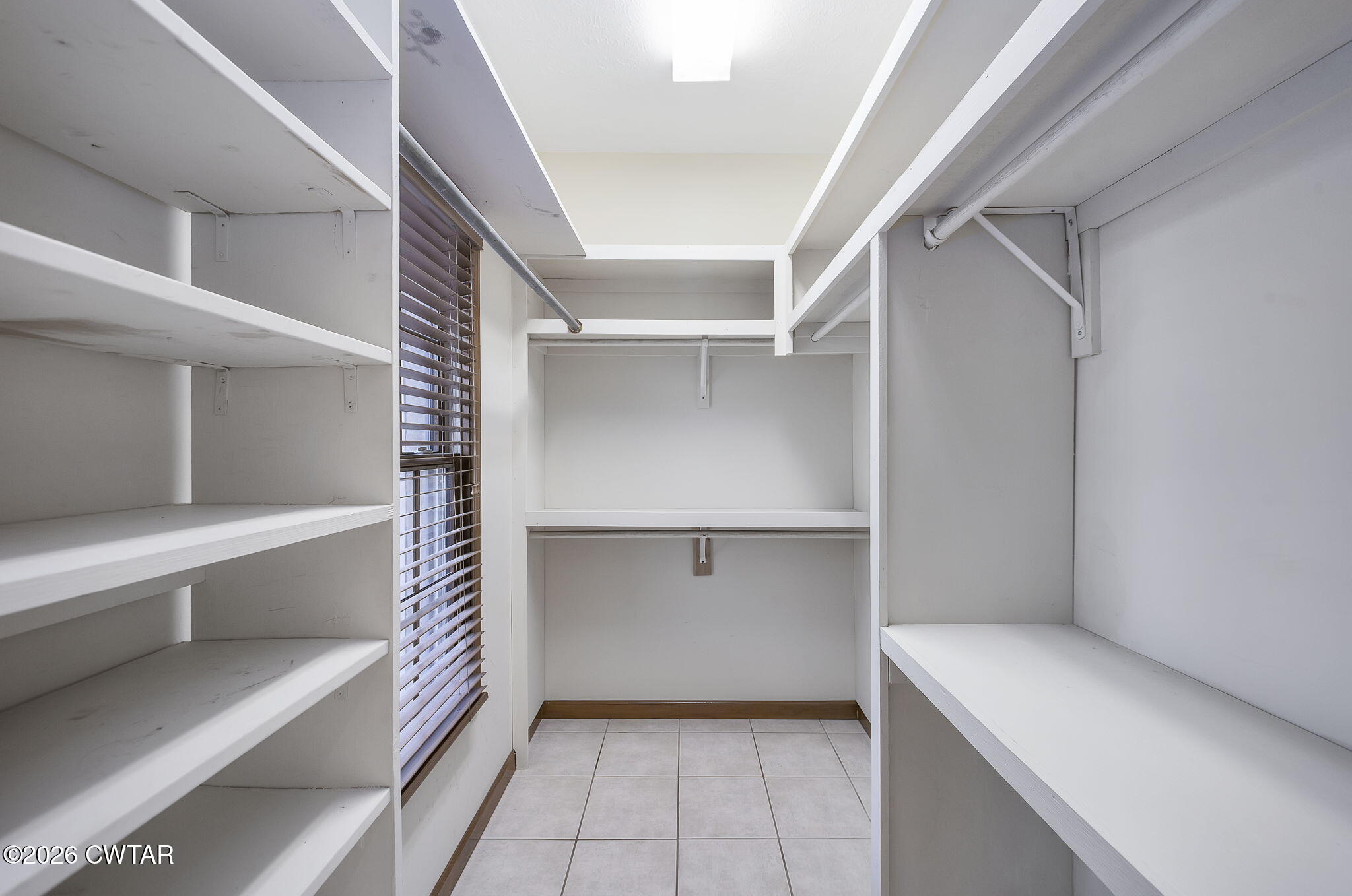 40 Pine Cove Parsons, TN 38363 - Photo 20 of 56 a view of an empty walk in closet