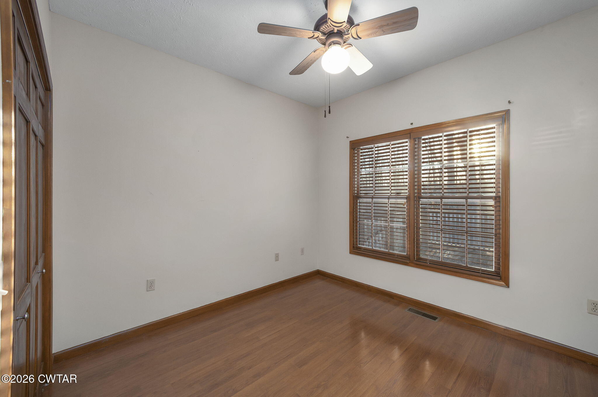40 Pine Cove Parsons, TN 38363 - Photo 23 of 56 a view of an empty room with a window