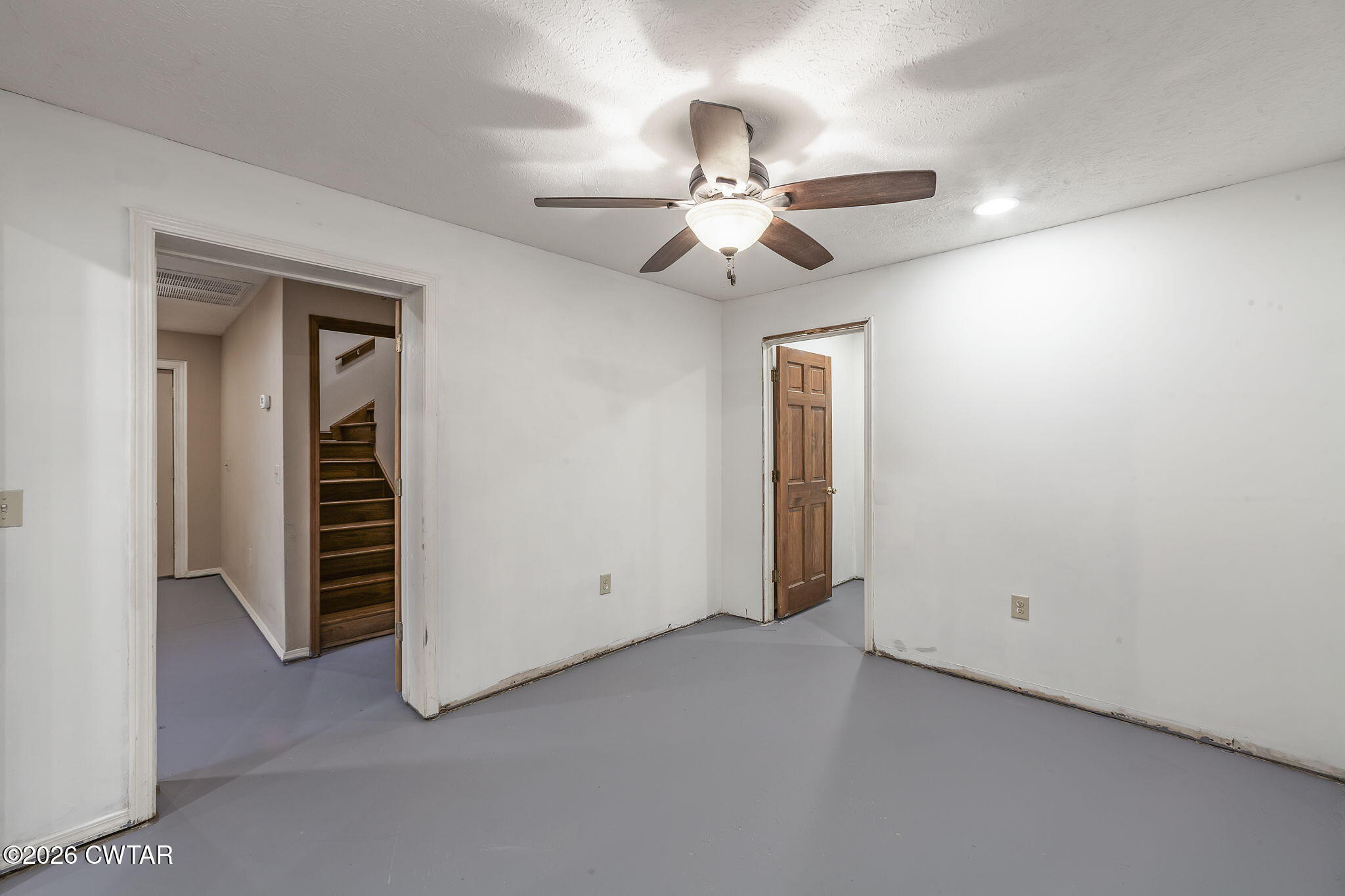 40 Pine Cove Parsons, TN 38363 - Photo 30 of 56 an empty room with closet and a ceiling fan
