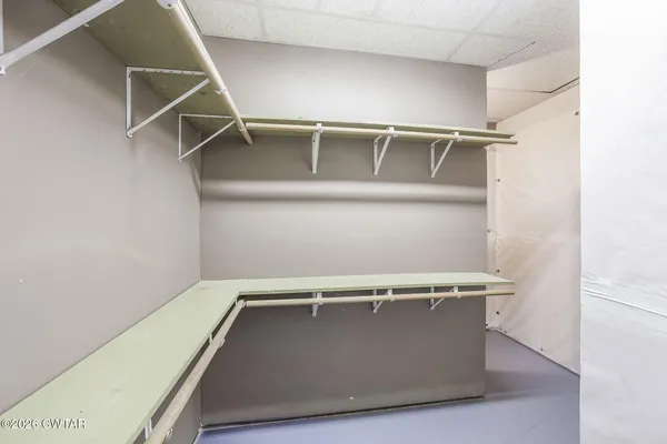 a view of a room with wooden walls