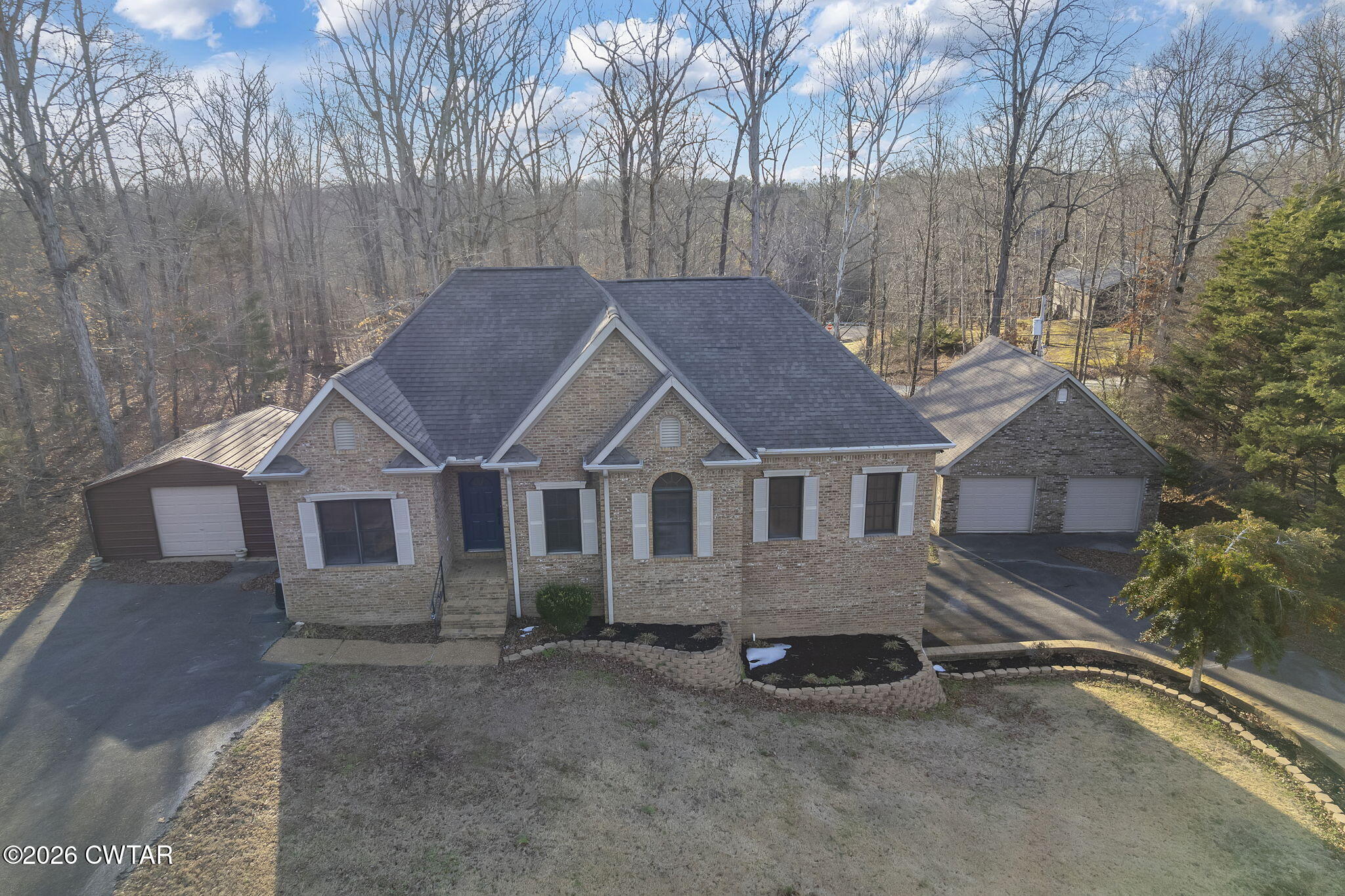 40 Pine Cove Parsons, TN 38363 - Photo 43 of 56 front view of a house with a yard