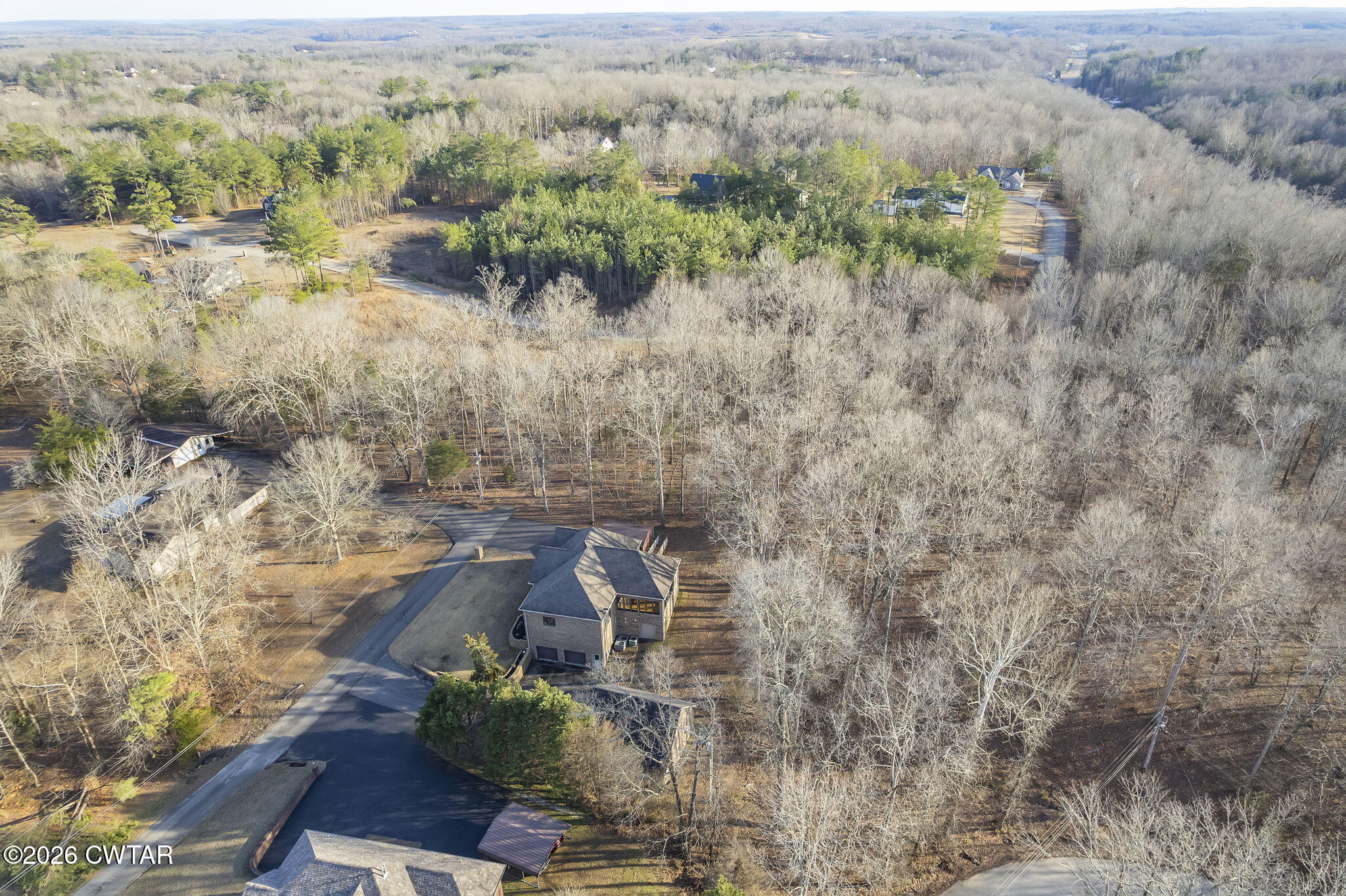 40 Pine Cove Parsons, TN 38363 - Photo 47 of 56 an aerial view of a house with a yard