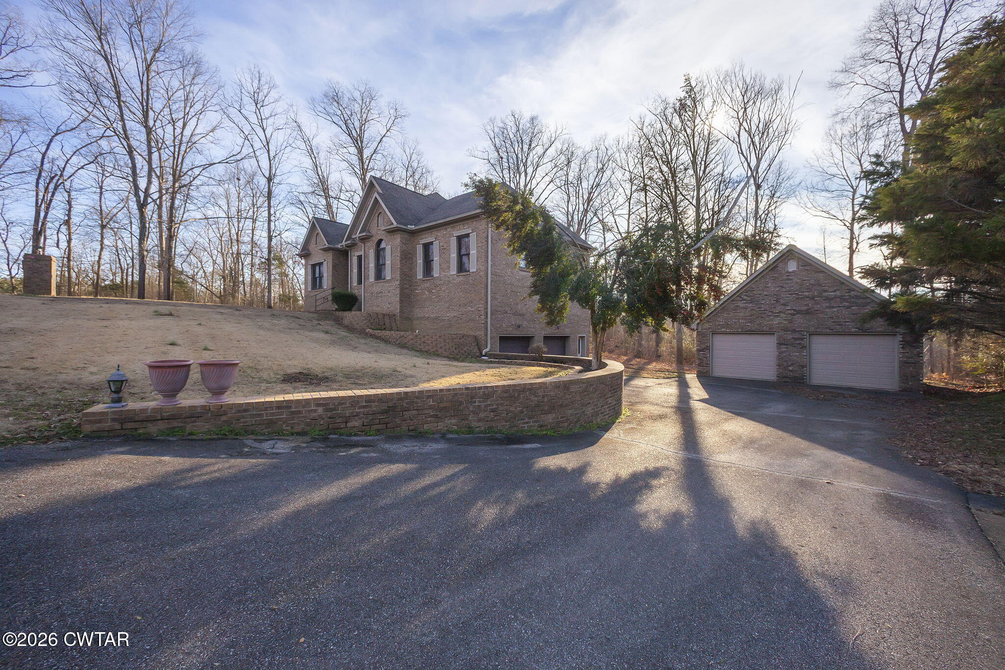40 Pine Cove Parsons, TN 38363 - Photo 50 of 56 a view of a house with a yard