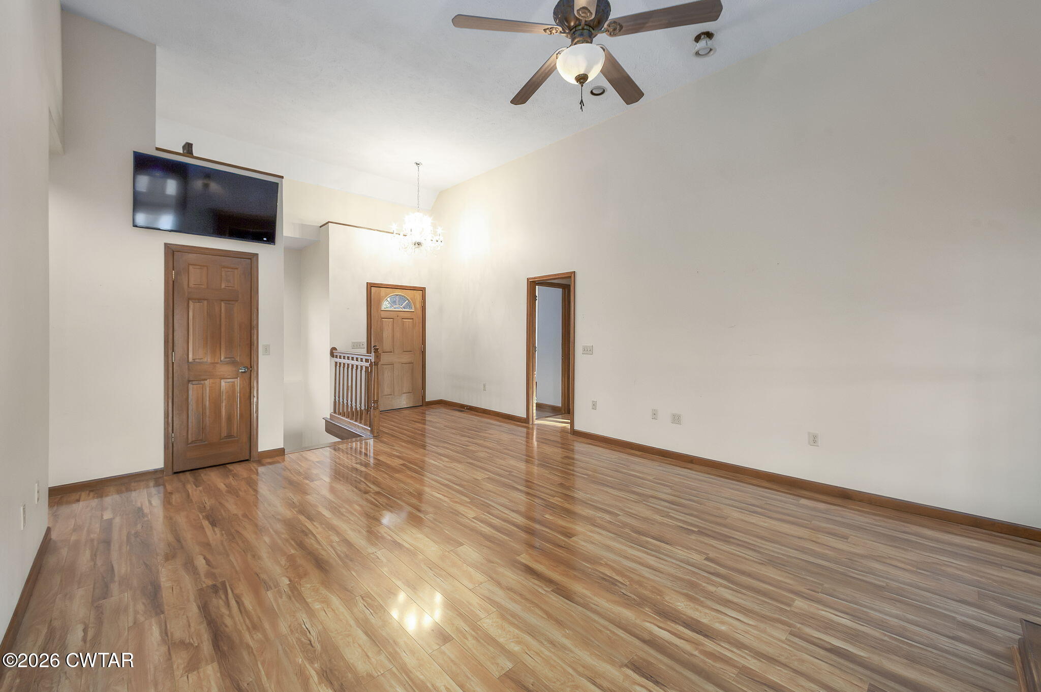 40 Pine Cove Parsons, TN 38363 - Photo 9 of 56 a view of empty room with wooden floor and fan