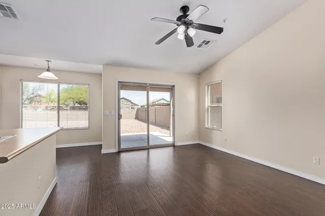 an empty room with windows