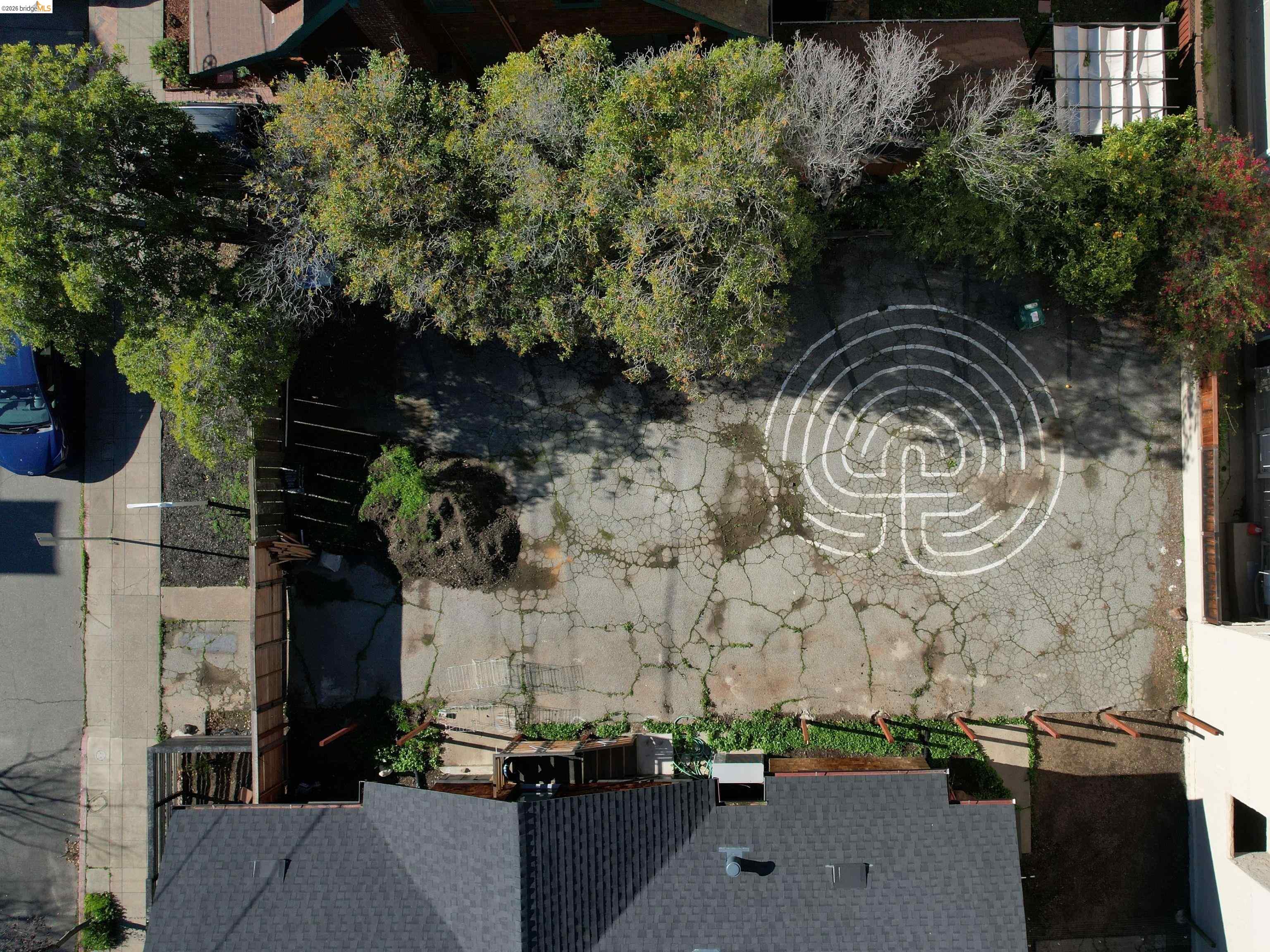 2477 Prince Street Berkeley, CA 94705 - Photo 9 of 10 an aerial view of a house with a yard